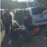 Mechanic sitting on the floor